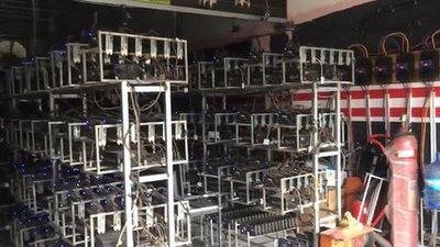 A well-organized mining farm full of hardware and miners in operation