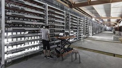 A glimpse into a Swedish mining farm with rows of machines